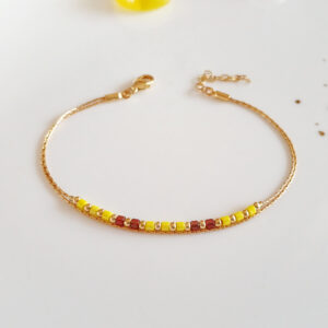 Subtle intersexual pride gold bracelet